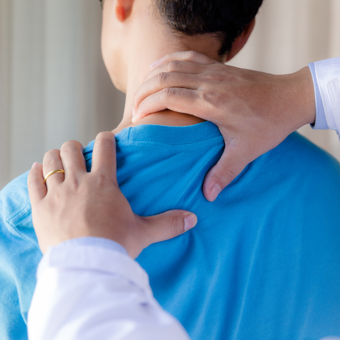 Dr. Gonzalez providing chiropractic care treatment